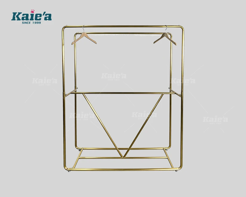 Expositor de ropa de acero inoxidable dorado A